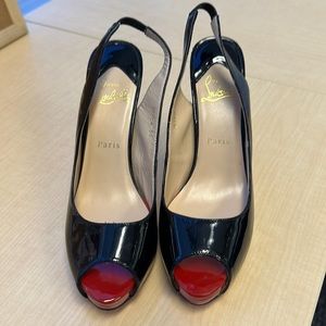Christian louboutin peep toe pumps